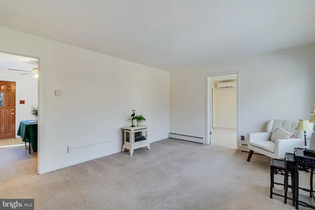 a view of workspace with furniture and windows