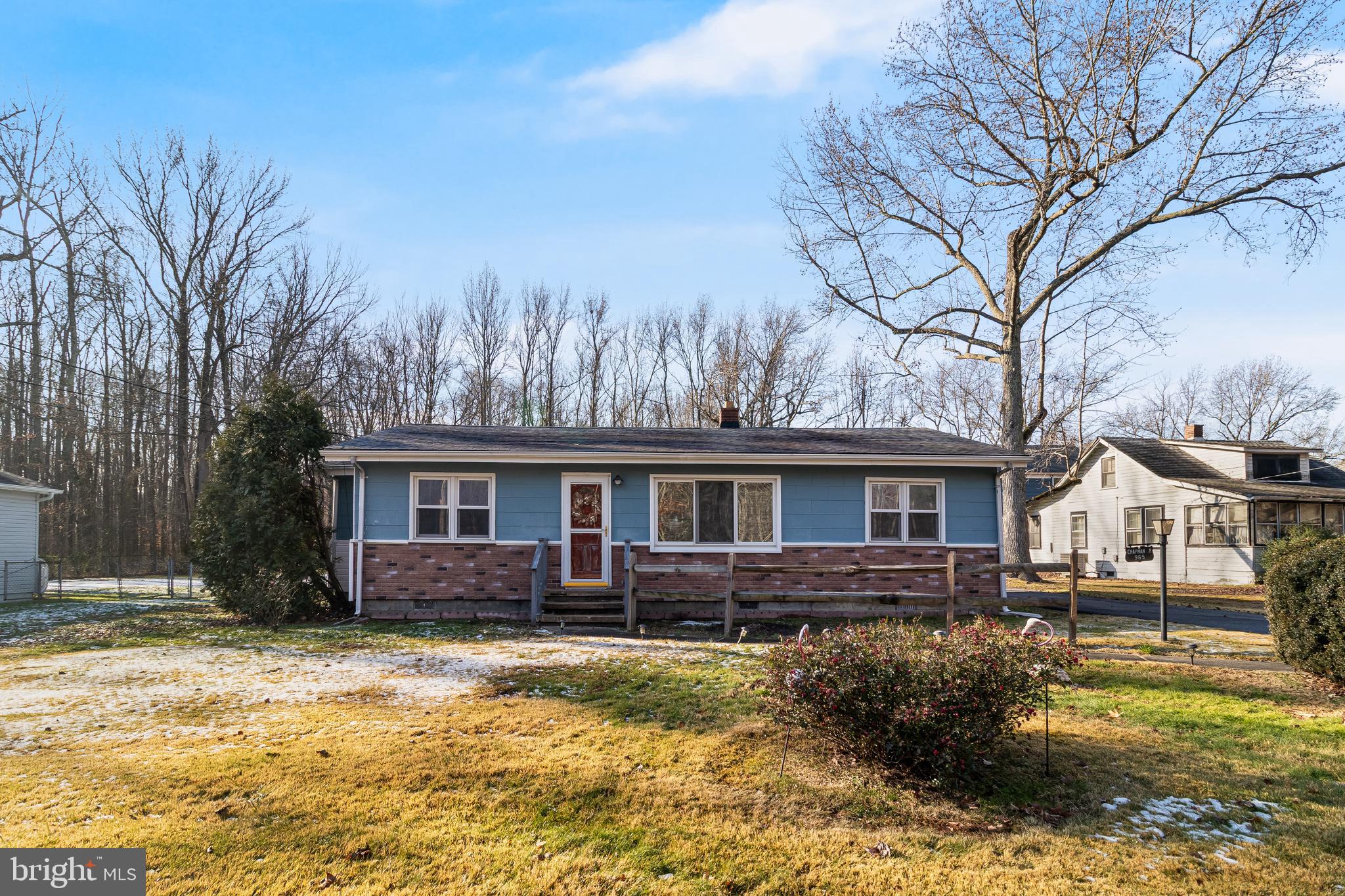 965 Franklin Manor Road Churchton, MD 20733 - Photo 2 of 34 a view of a house with a yard covered with snow in front of house