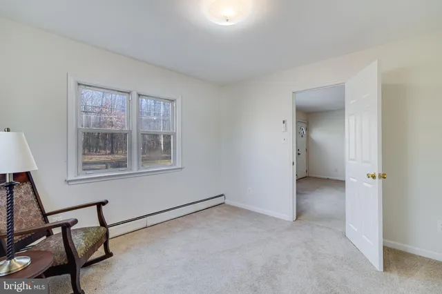 a bathroom with a tub and shower