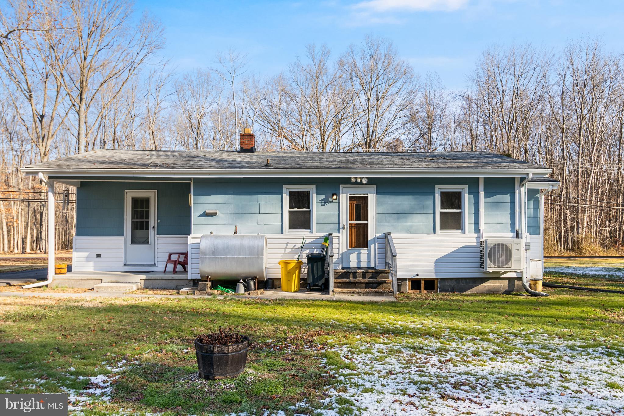 965 Franklin Manor Road Churchton, MD 20733 - Photo 27 of 34 a front view of house with outdoor seating
