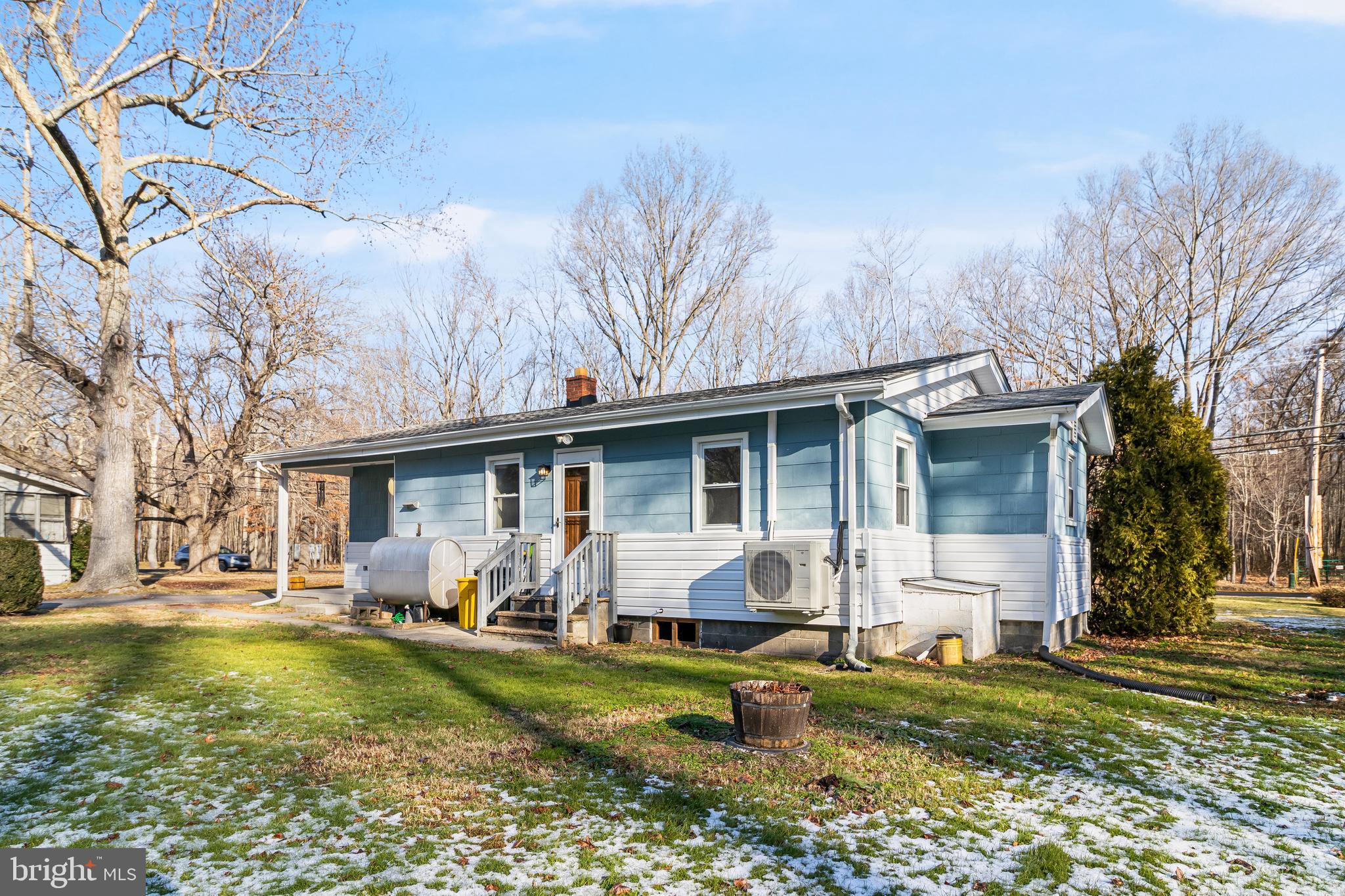 965 Franklin Manor Road Churchton, MD 20733 - Photo 28 of 34 a view of a yard with a house in the background