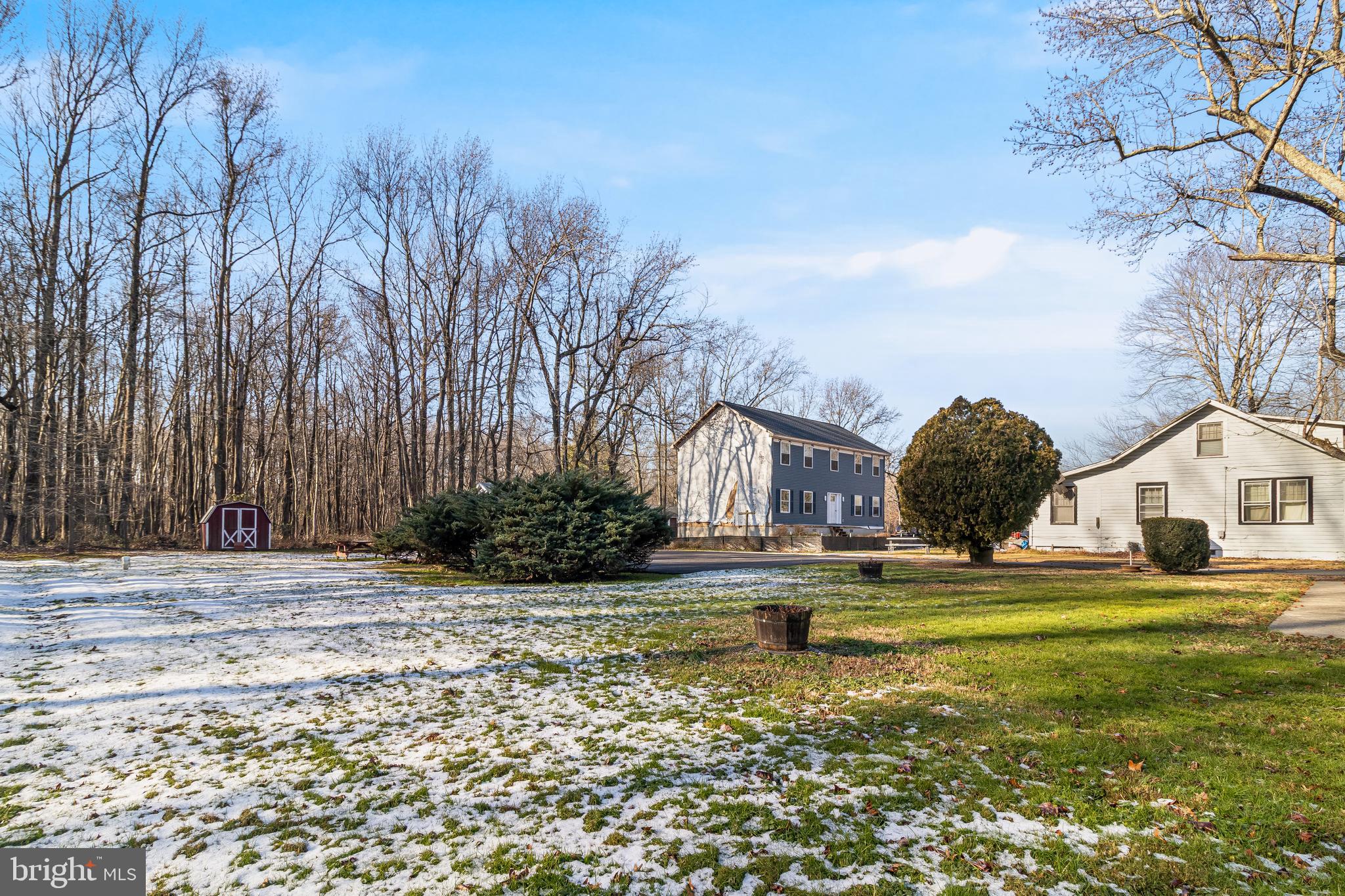 965 Franklin Manor Road Churchton, MD 20733 - Photo 31 of 34 a view of a large house with a big yard and large trees