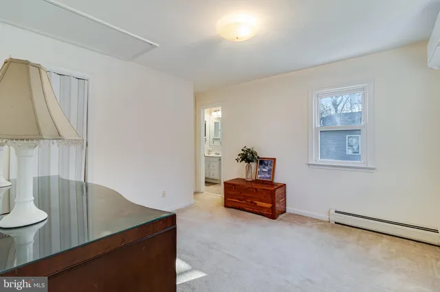 a view of room with furniture and wooden floor