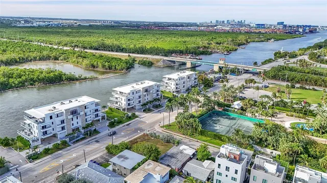 an aerial view of a house with a garden