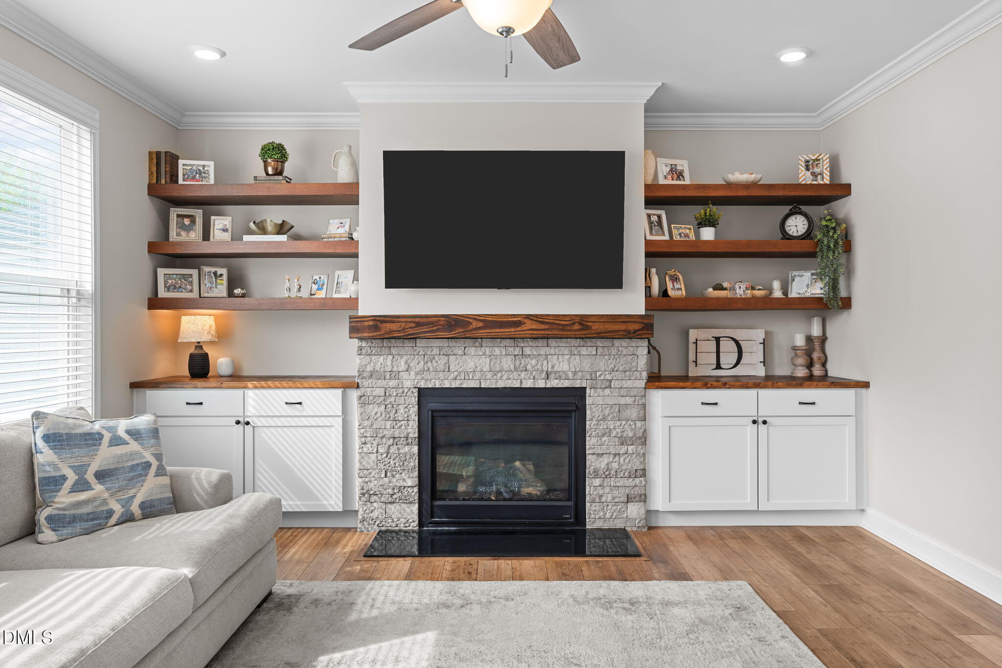145 Shadowdale Lane Rolesville, NC 27571 - Photo 12 of 43 a living room with furniture and a fireplace