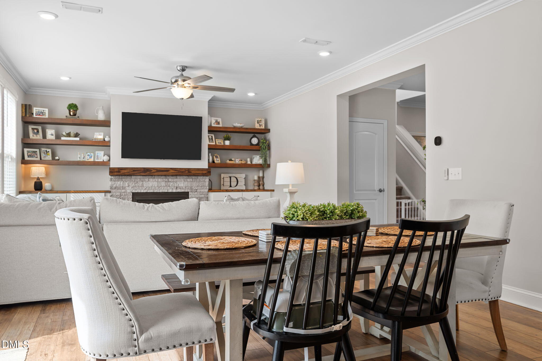 145 Shadowdale Lane Rolesville, NC 27571 - Photo 15 of 43 a view of a dining room with furniture and a flat screen tv