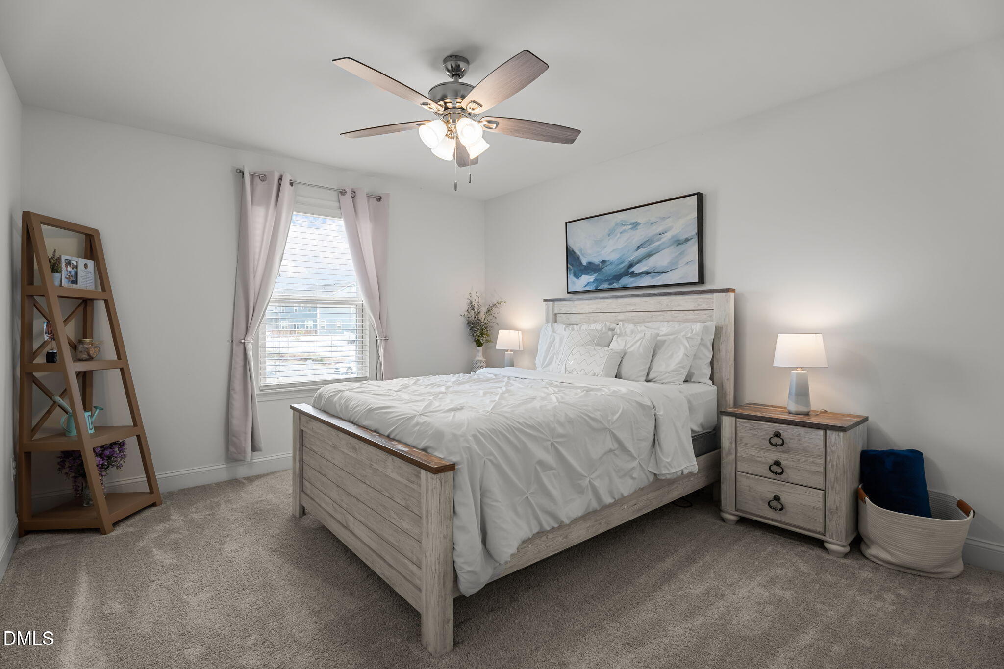 145 Shadowdale Lane Rolesville, NC 27571 - Photo 25 of 43 a bedroom with a bed and a chandelier