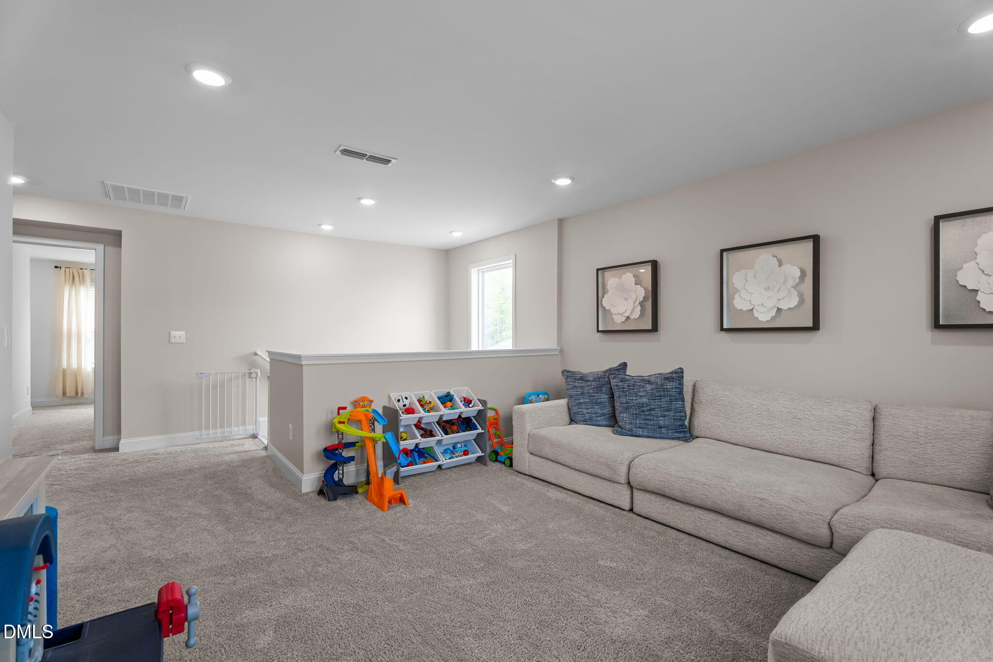 145 Shadowdale Lane Rolesville, NC 27571 - Photo 31 of 43 a living room with furniture and a couch