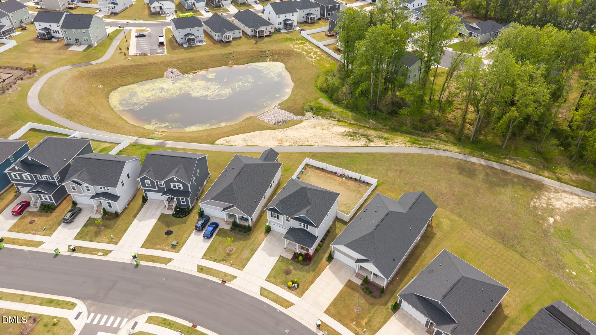 145 Shadowdale Lane Rolesville, NC 27571 - Photo 42 of 43 a view of a swimming pool with a patio
