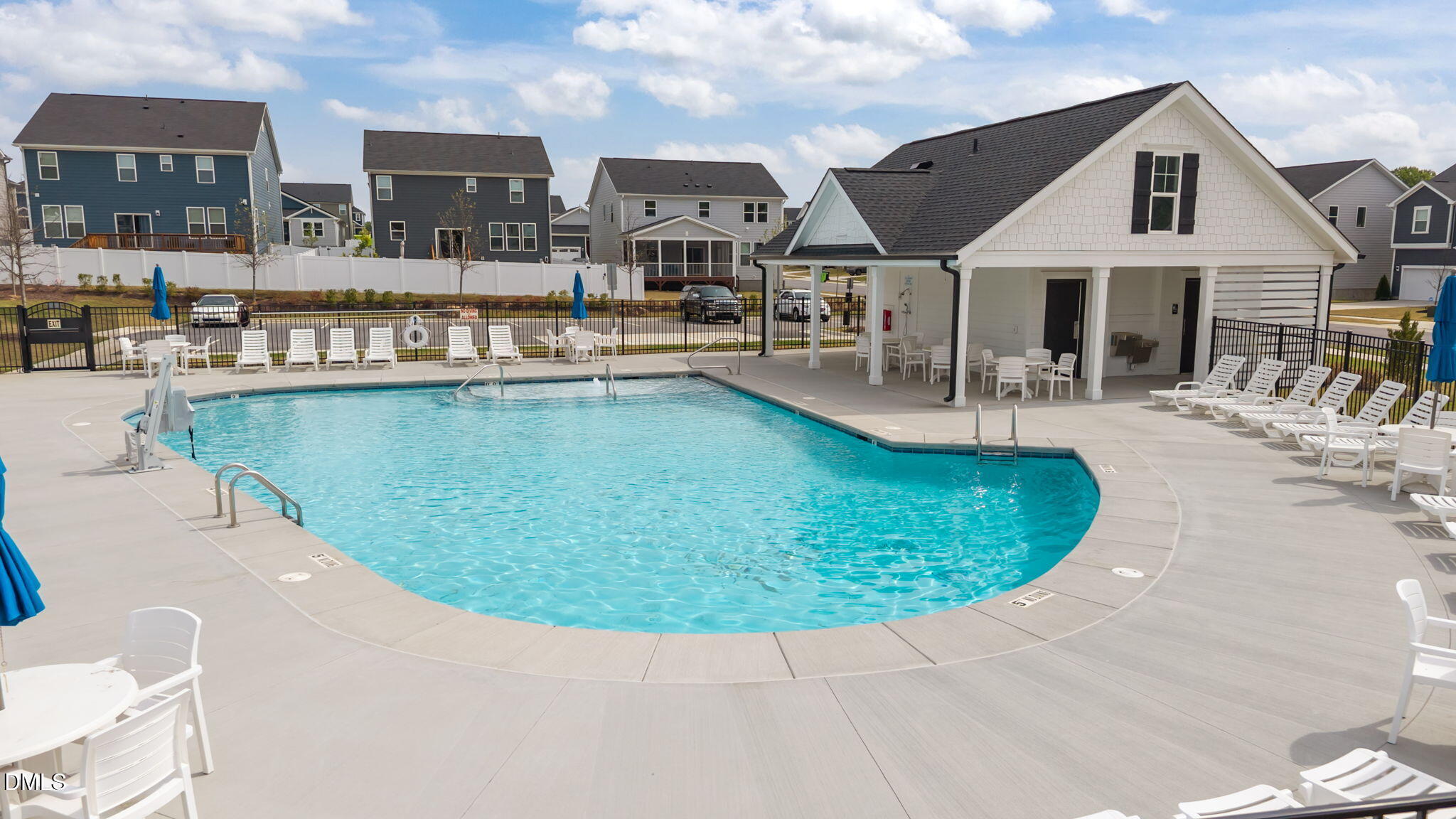 145 Shadowdale Lane Rolesville, NC 27571 - Photo 7 of 43 a view of a swimming pool with outdoor seating