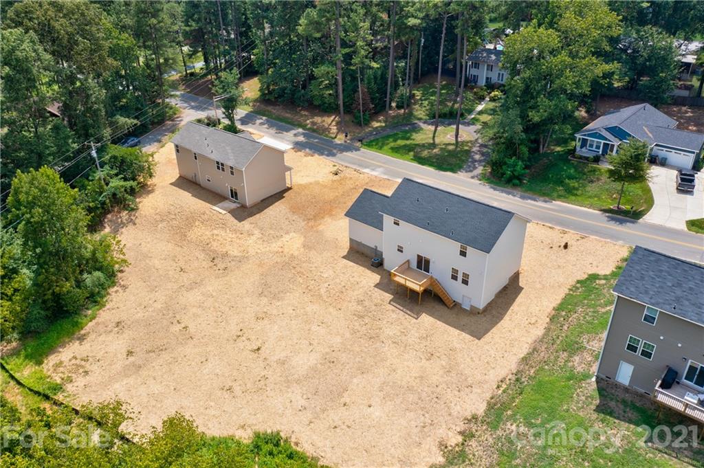 1802 Love Road Monroe, NC 28110 - Photo 3 of 48 an aerial view of a house with yard swimming pool and outdoor seating