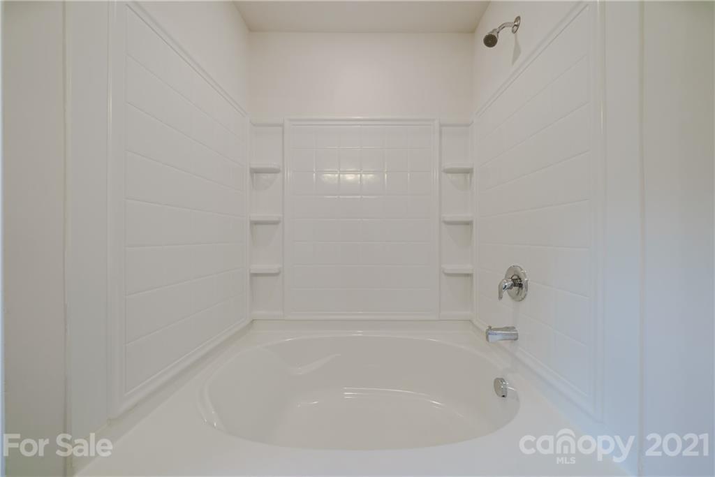 1802 Love Road Monroe, NC 28110 - Photo 28 of 48 a bathroom with a bathtub