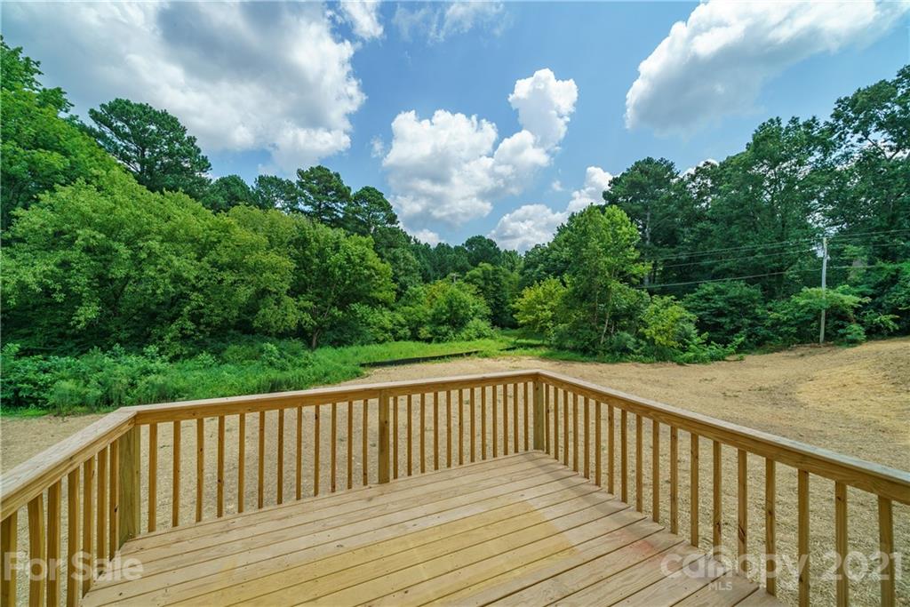 1802 Love Road Monroe, NC 28110 - Photo 4 of 48 a view of balcony with wooden floor