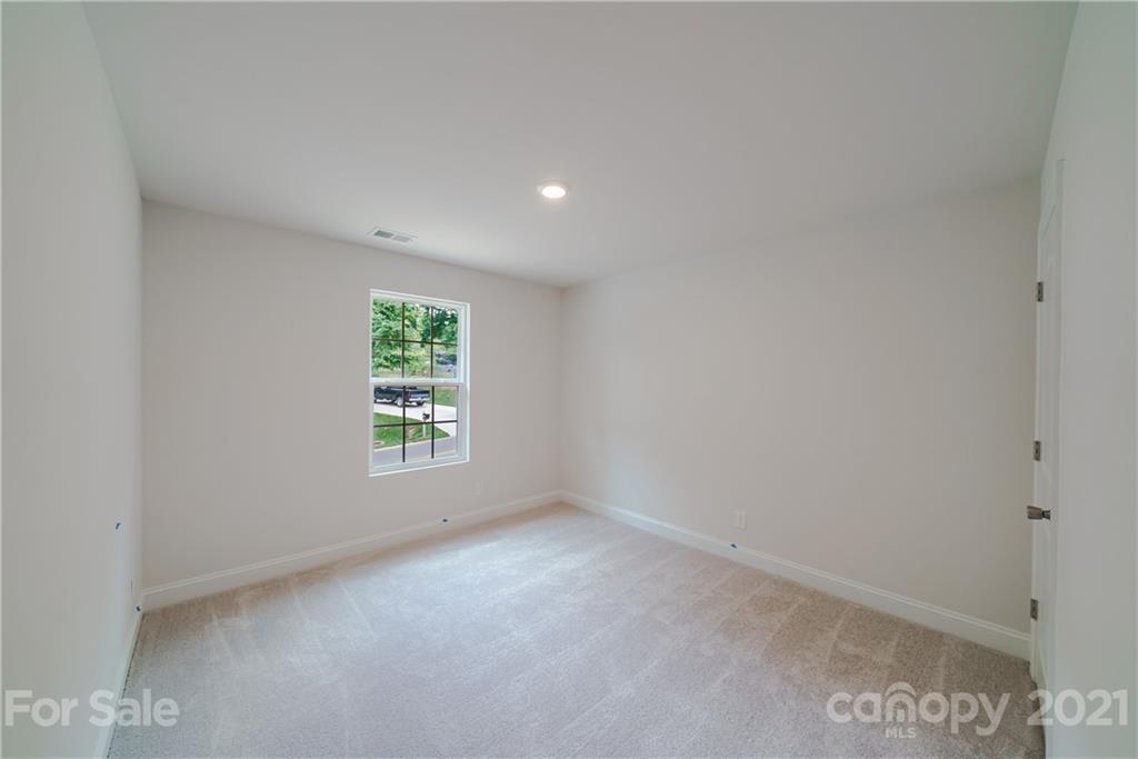1802 Love Road Monroe, NC 28110 - Photo 31 of 48 a view of an empty room with a window