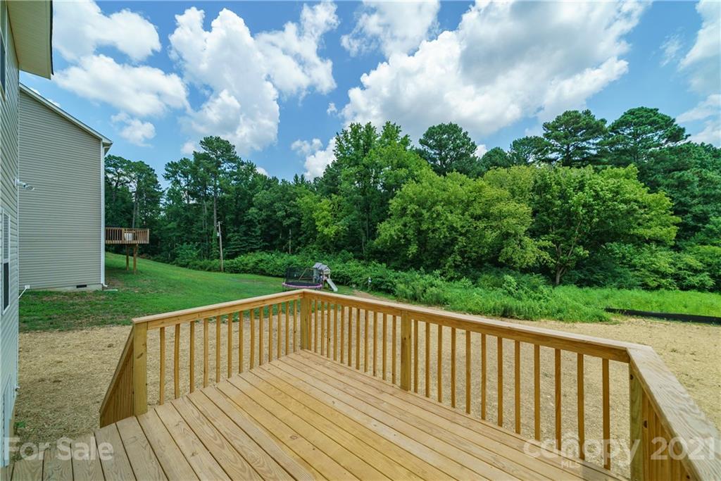 1802 Love Road Monroe, NC 28110 - Photo 37 of 48 a view of balcony with wooden floor