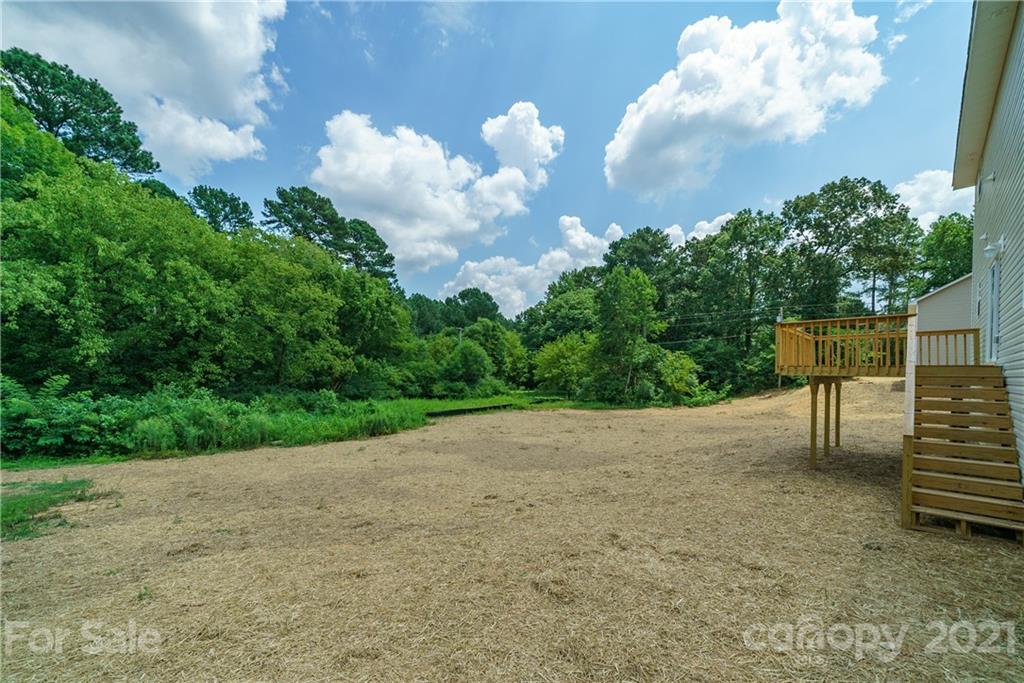 1802 Love Road Monroe, NC 28110 - Photo 38 of 48 a view of a back yard