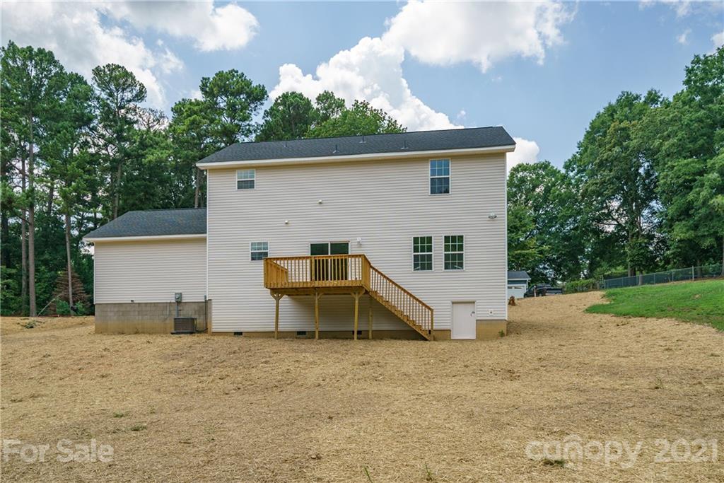 1802 Love Road Monroe, NC 28110 - Photo 40 of 48 a view of a house with a yard