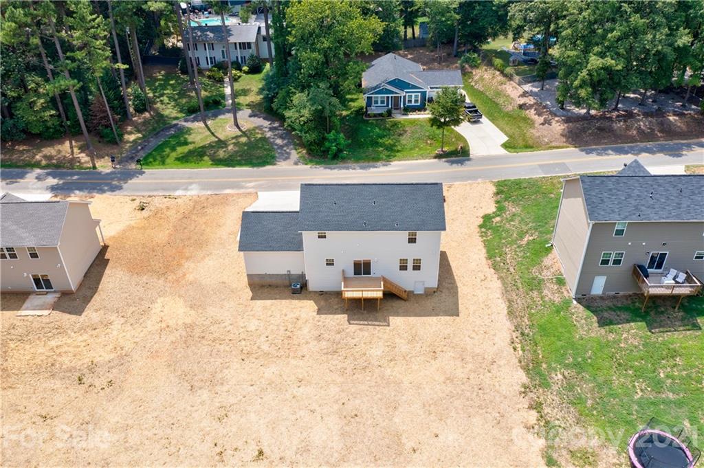 1802 Love Road Monroe, NC 28110 - Photo 48 of 48 an aerial view of a house with yard and parking