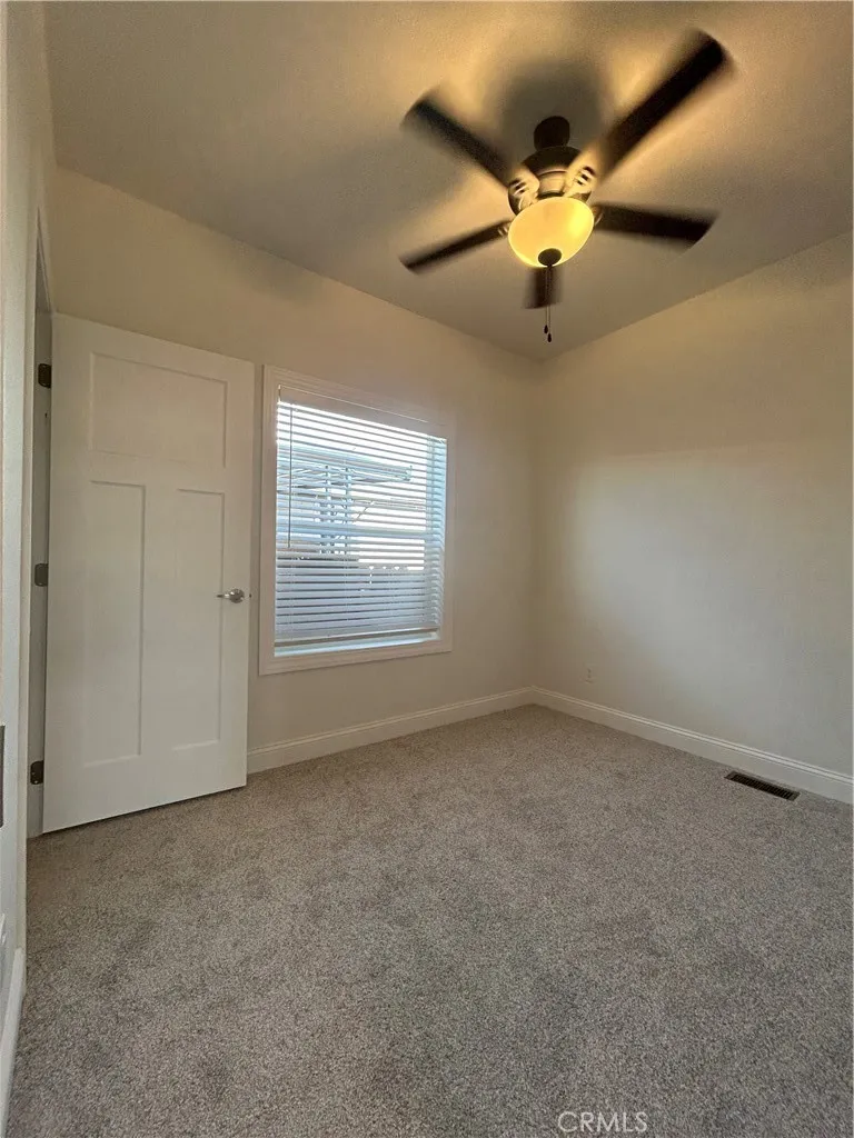 600 Gladstone, Unit 45 Azusa, CA 91702 - Photo 9 of 16 an empty room with windows and fan