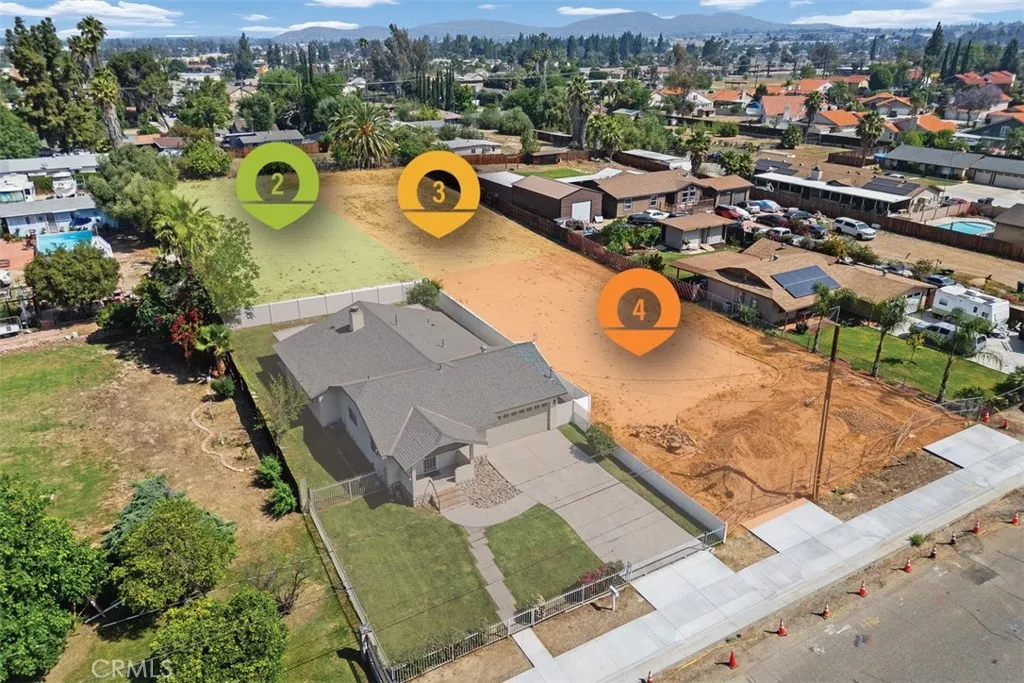 0 Duncan Riverside, CA 92503 - Photo 2 of 7 an aerial view of a house with a swimming pool