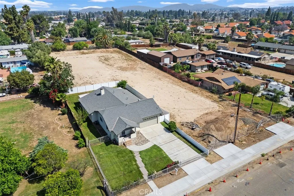 0 Duncan Riverside, CA 92503 - Photo 3 of 7 an aerial view of a house with a yard and lake view