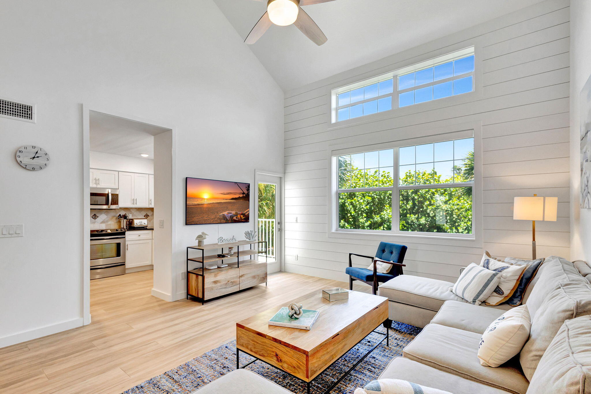 105 Mainsail Circle Jupiter, FL 33477 - Photo 15 of 85 a living room with furniture and a flat screen tv