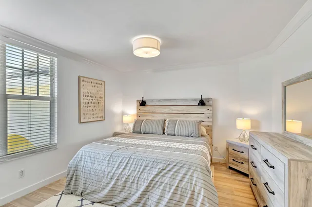 a view of washer and dryer with kitchen in the background