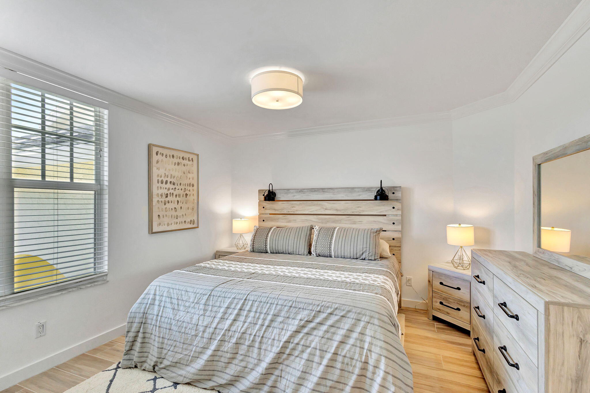 105 Mainsail Circle Jupiter, FL 33477 - Photo 25 of 85 a bedroom with a bed and a window