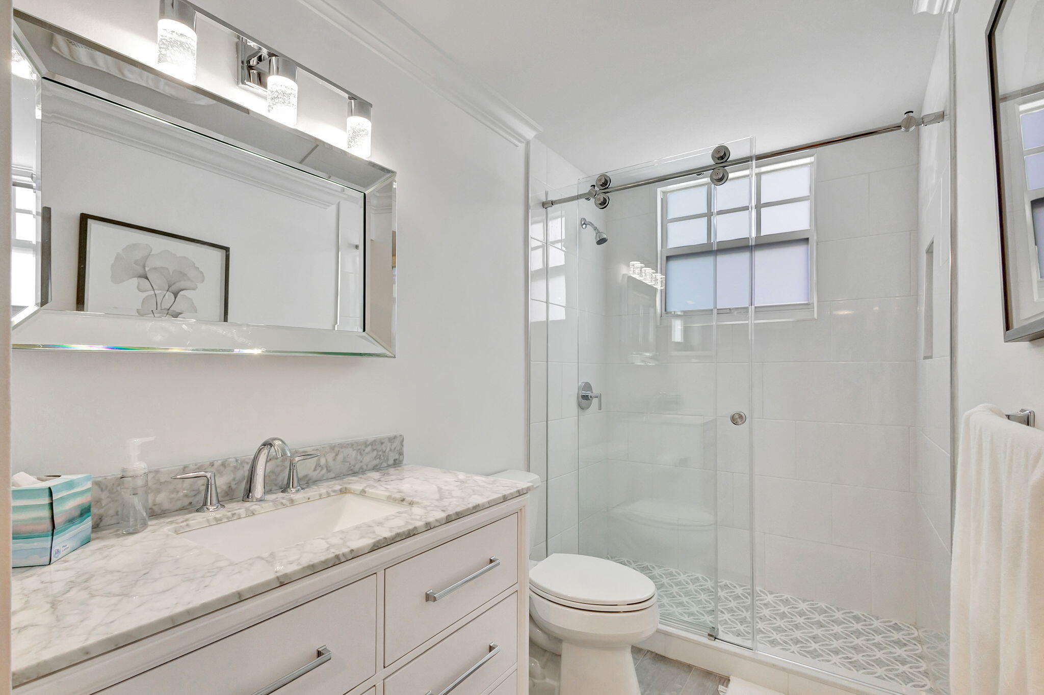 105 Mainsail Circle Jupiter, FL 33477 - Photo 27 of 85 a bathroom with a granite countertop sink toilet and shower