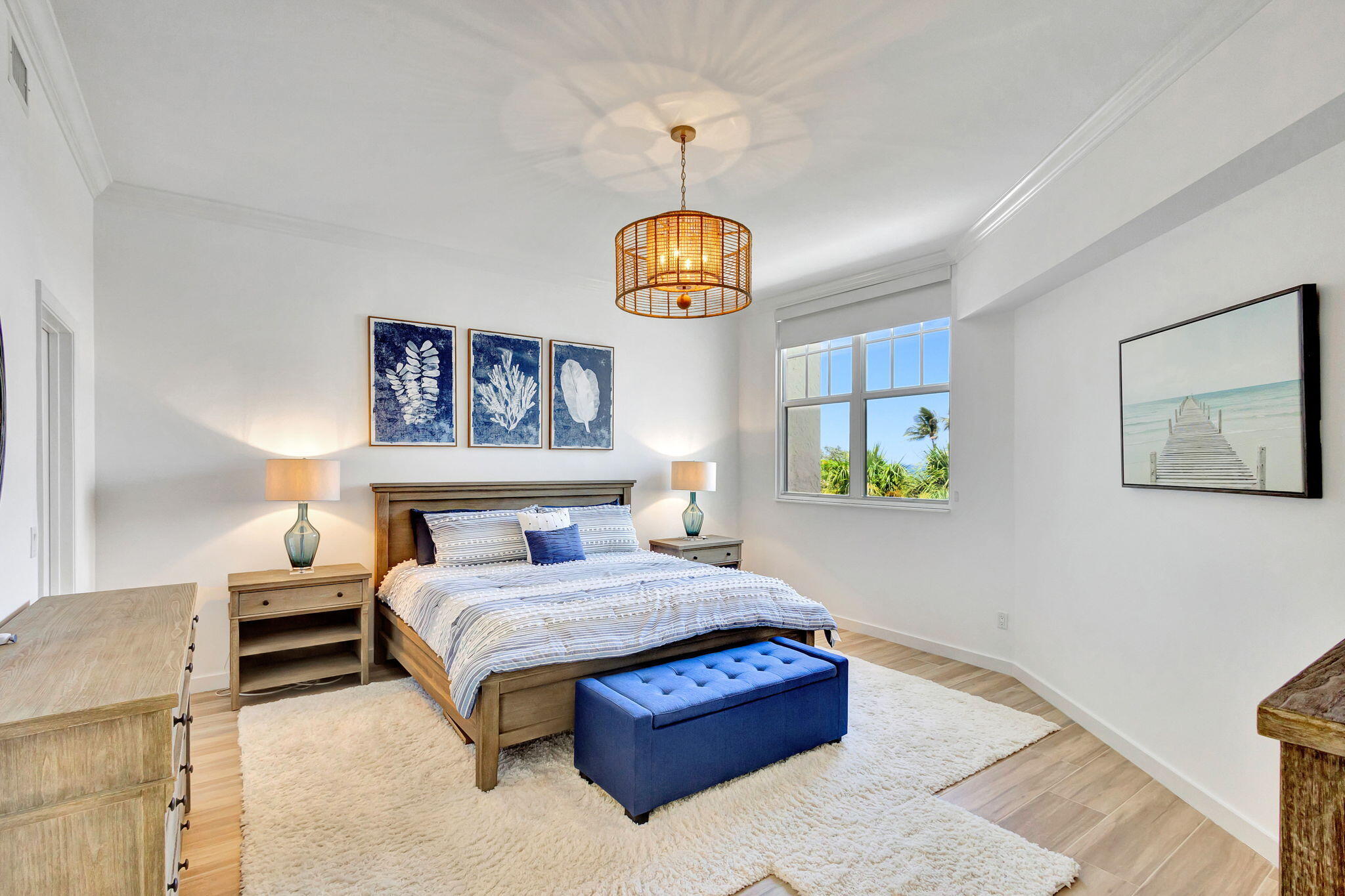 105 Mainsail Circle Jupiter, FL 33477 - Photo 36 of 85 a bedroom with a bed and a painting on the wall