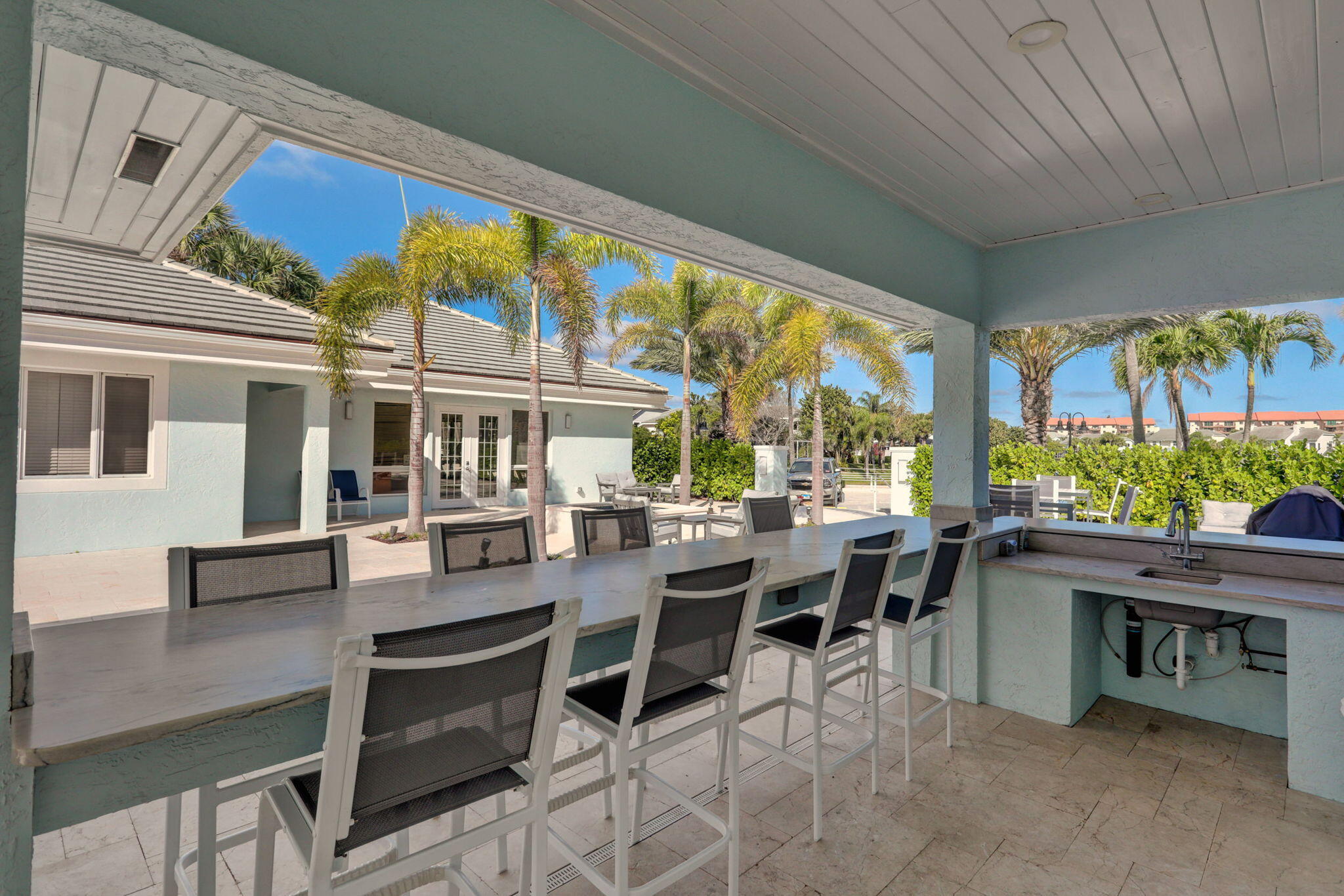 105 Mainsail Circle Jupiter, FL 33477 - Photo 46 of 85 a view of a dining room with furniture window and outside view