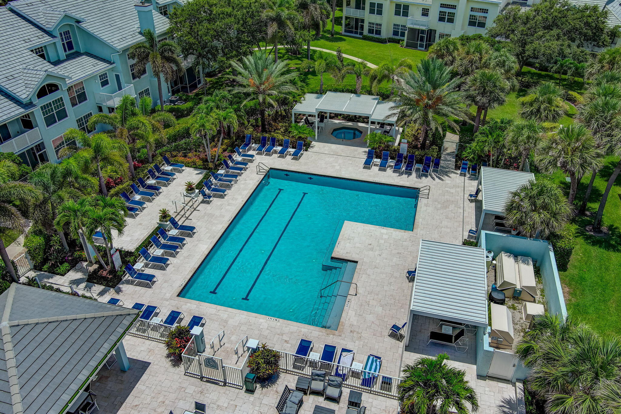 105 Mainsail Circle Jupiter, FL 33477 - Photo 63 of 85 an aerial view of a house with outdoor space and trees all around