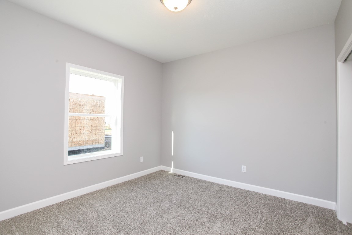 2935 Glendale Lane Normal, IL 61761 - Photo 18 of 29 an empty room with a window