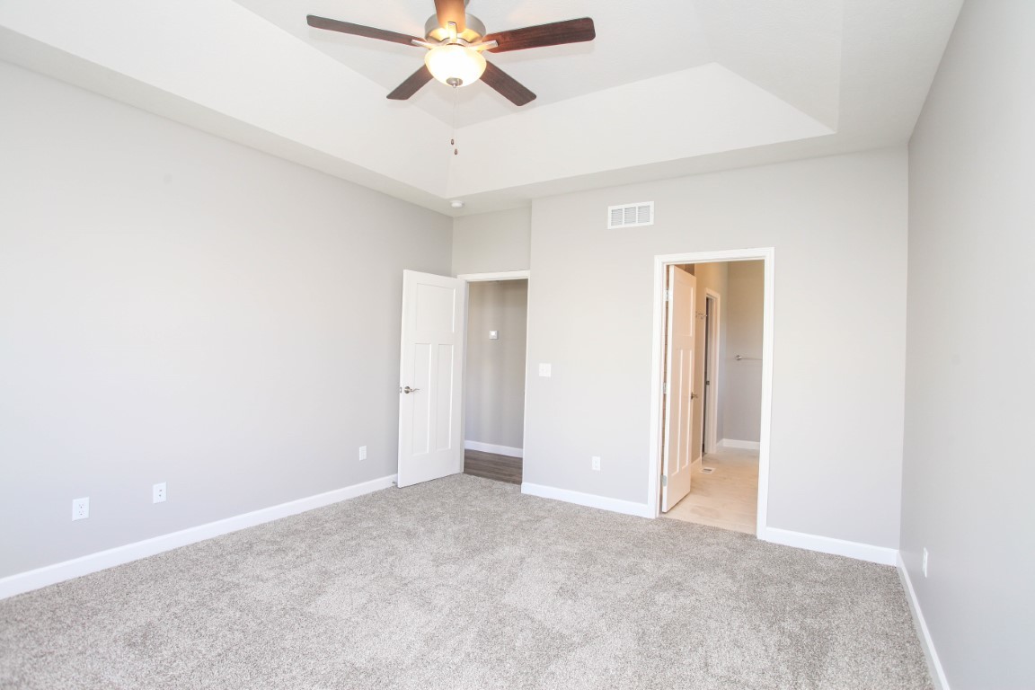 2935 Glendale Lane Normal, IL 61761 - Photo 21 of 29 an empty room with a fan & a fan