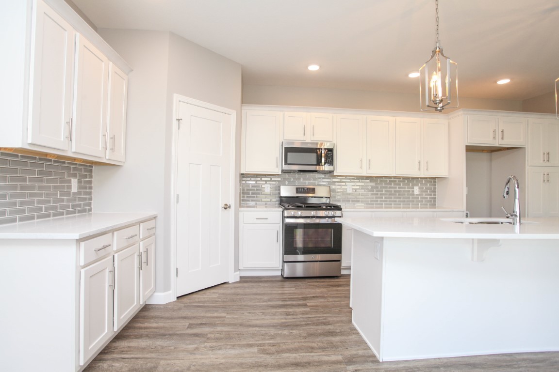 2935 Glendale Lane Normal, IL 61761 - Photo 6 of 29 a kitchen with stainless steel appliances a sink stove and refrigerator