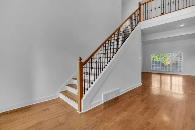 a view of entryway with wooden floor