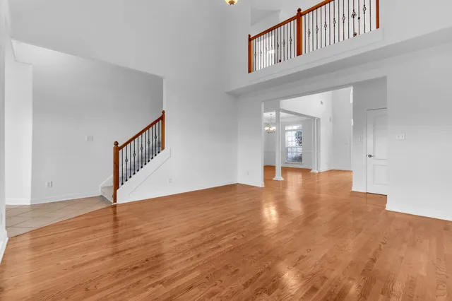 a view of an entryway with wooden floor
