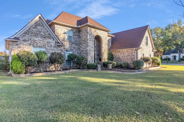 a view of a house with a swimming pool