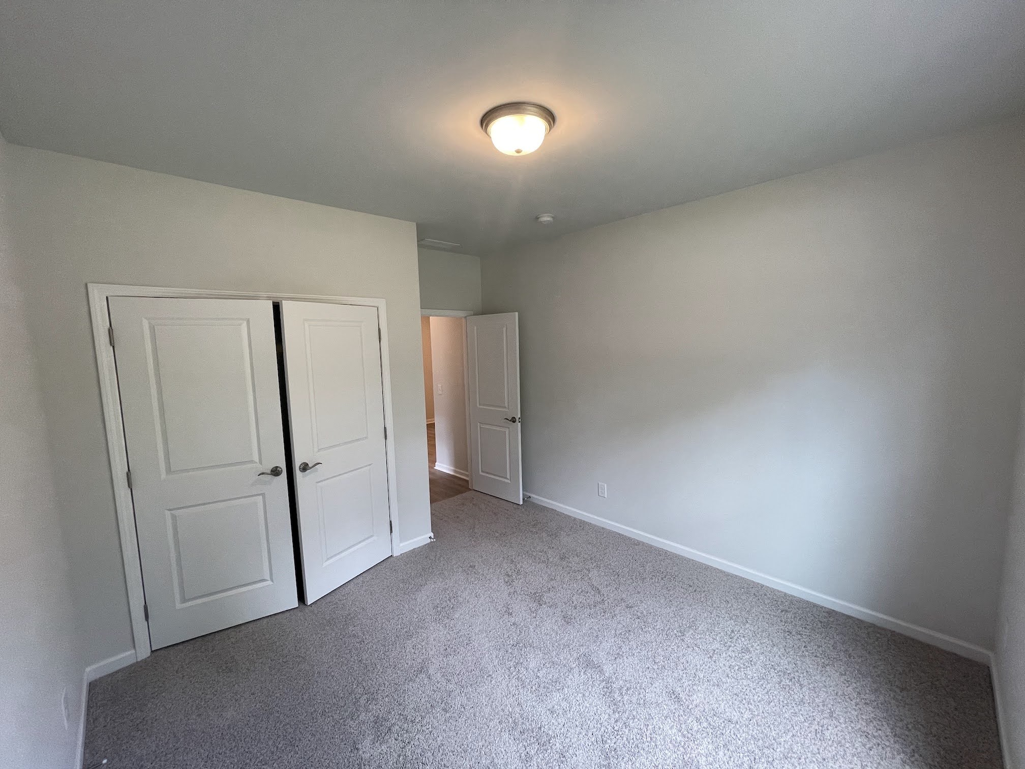 2922 Campanella Drive Murfreesboro, TN 37128 - Photo 8 of 21 an empty room with a door and mirror