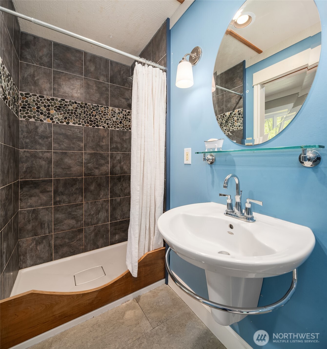 19416 Beall Road Southwest Vashon, WA 98070 - Photo 18 of 40 a bathroom with a sink and a mirror