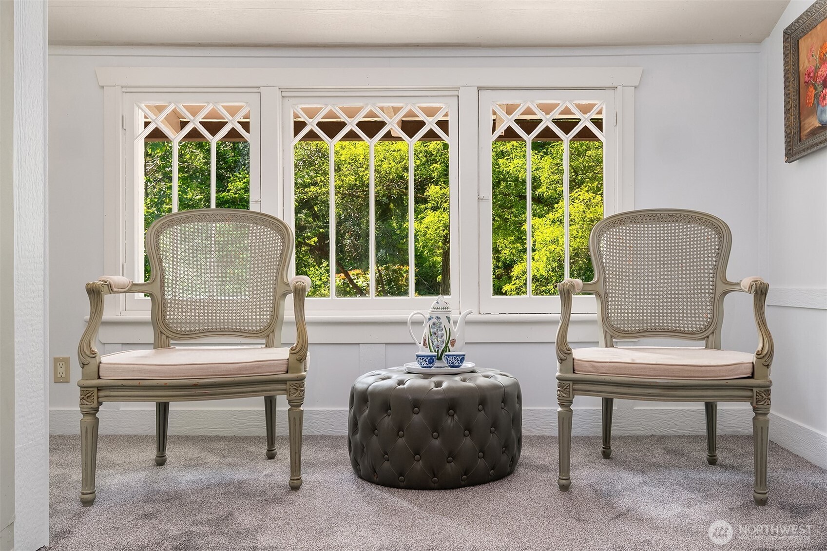 19416 Beall Road Southwest Vashon, WA 98070 - Photo 23 of 40 a living room with furniture and a potted plant