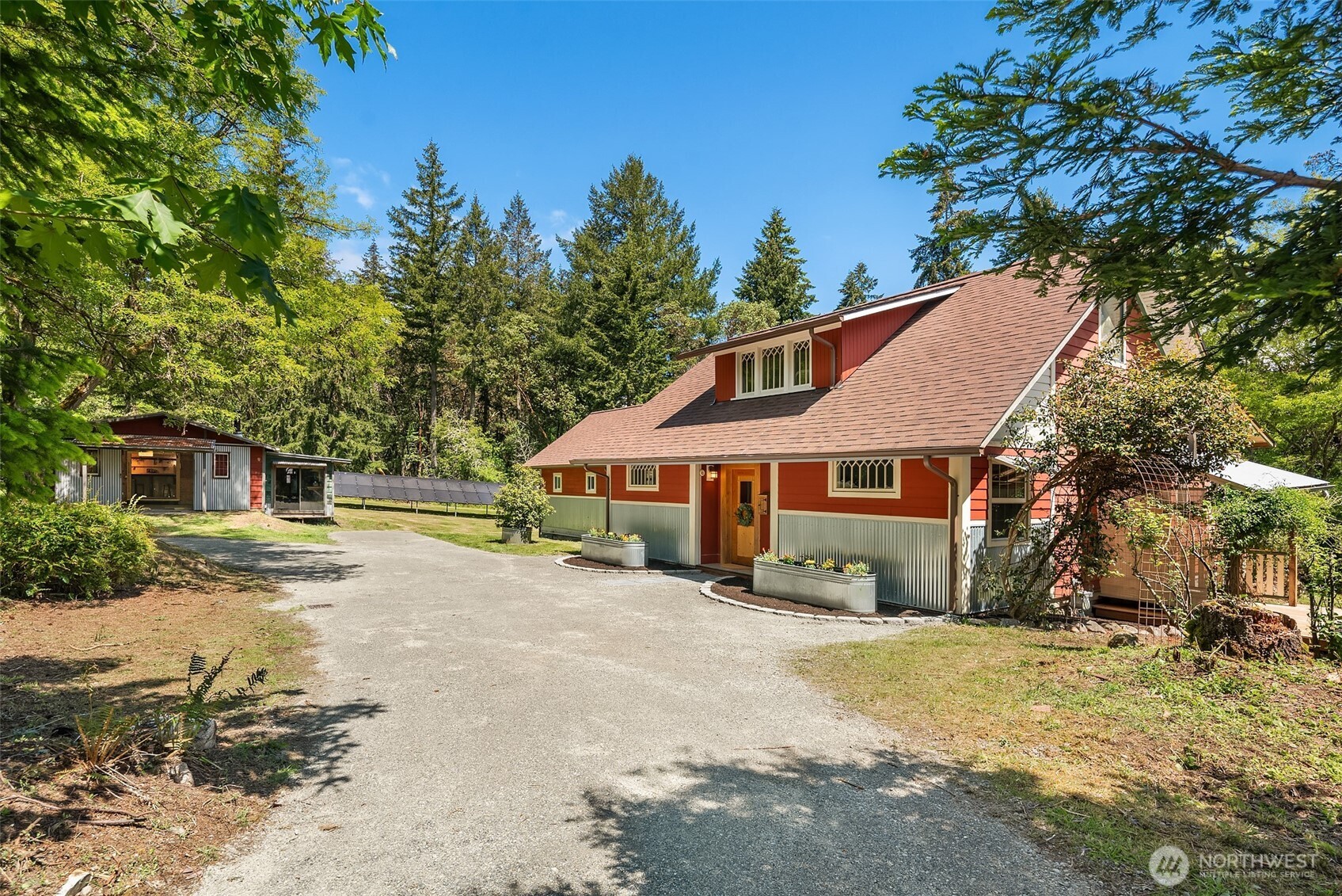 19416 Beall Road Southwest Vashon, WA 98070 - Photo 39 of 40 a view of a house with a yard and large tree