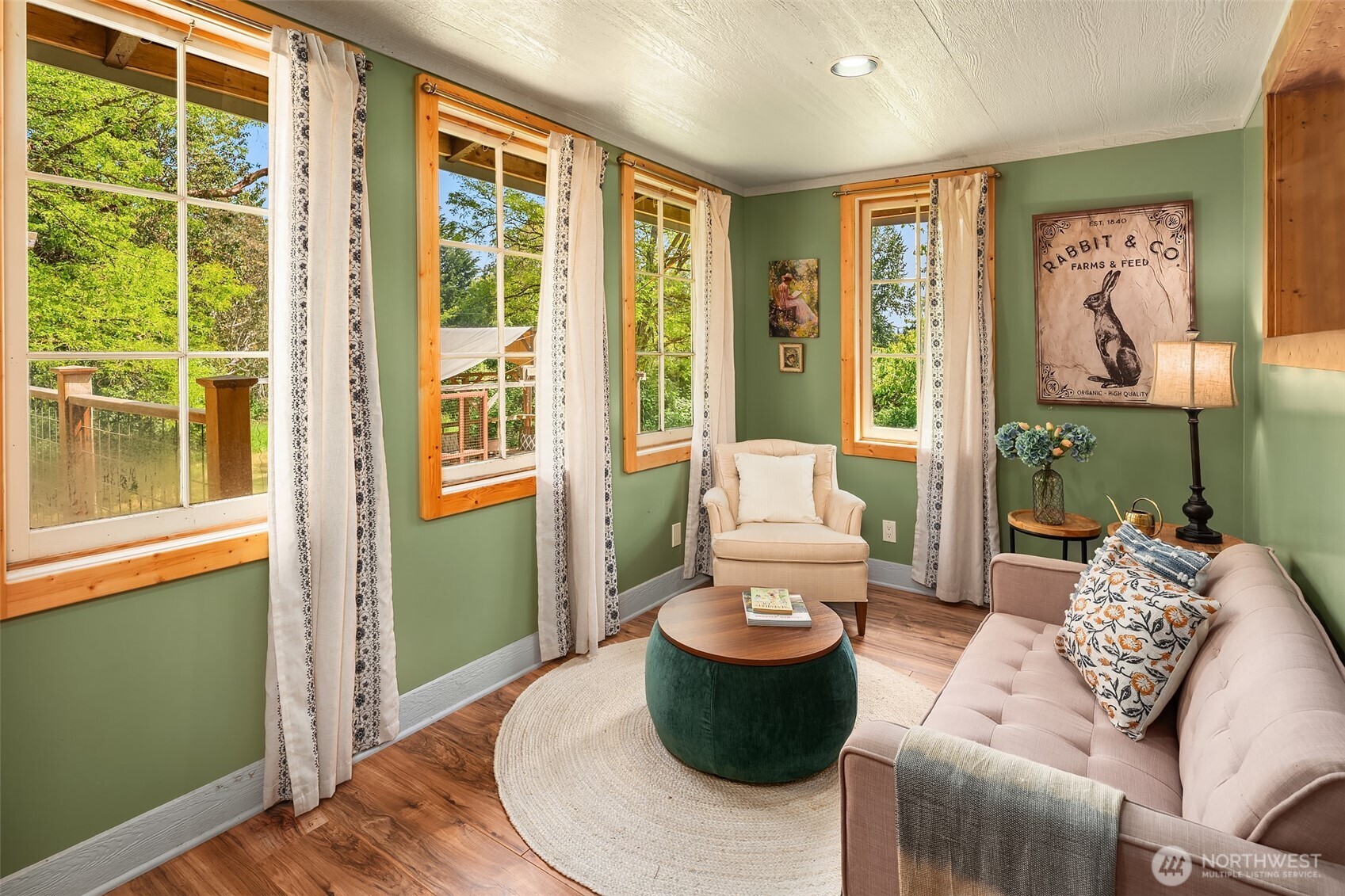 19416 Beall Road Southwest Vashon, WA 98070 - Photo 10 of 40 a living room with furniture and a window