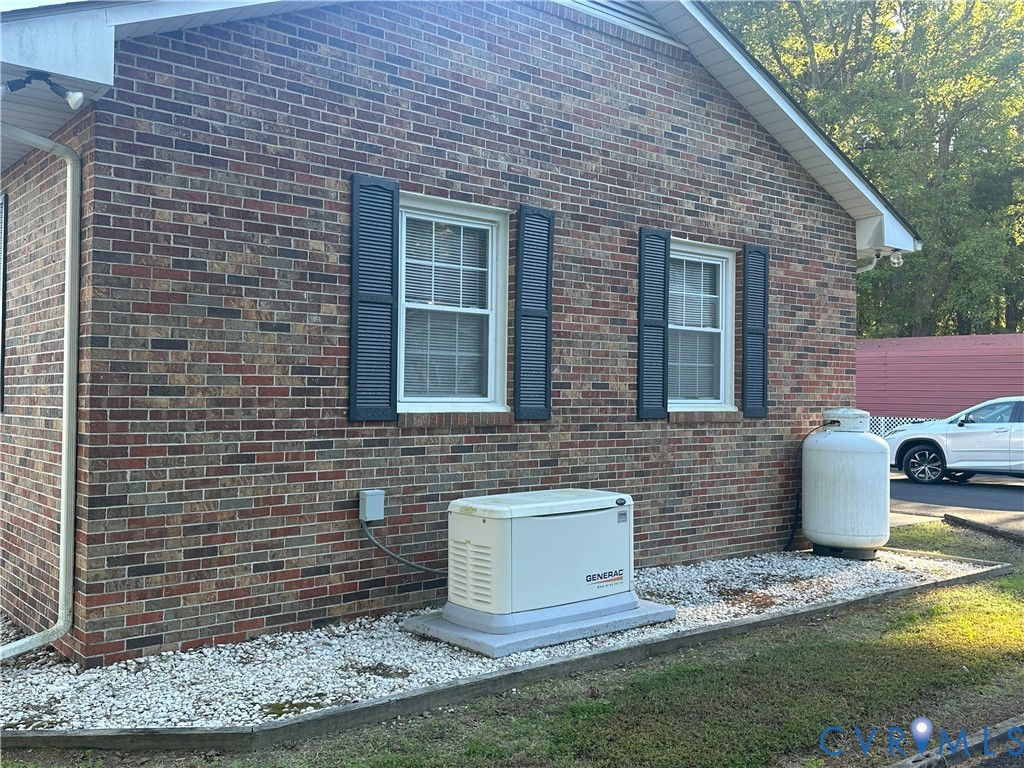 a view of house with yard