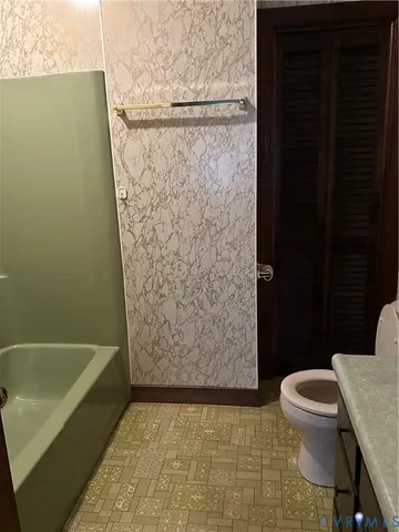 a bathroom with a sink and a toilet