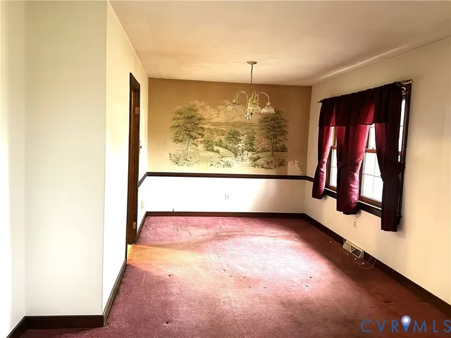 a view of a room with a large window