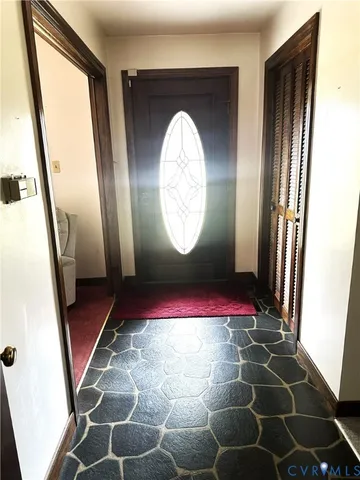 a bathroom with a toilet and shower