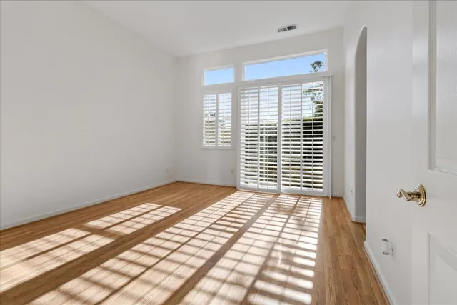 a view of an empty room and window