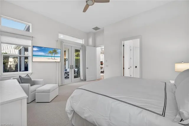 a bedroom with a bed and a cabinets