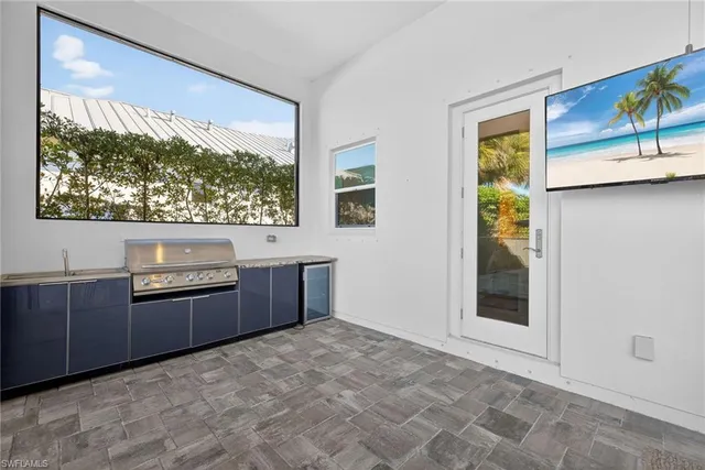 a room with window and furniture